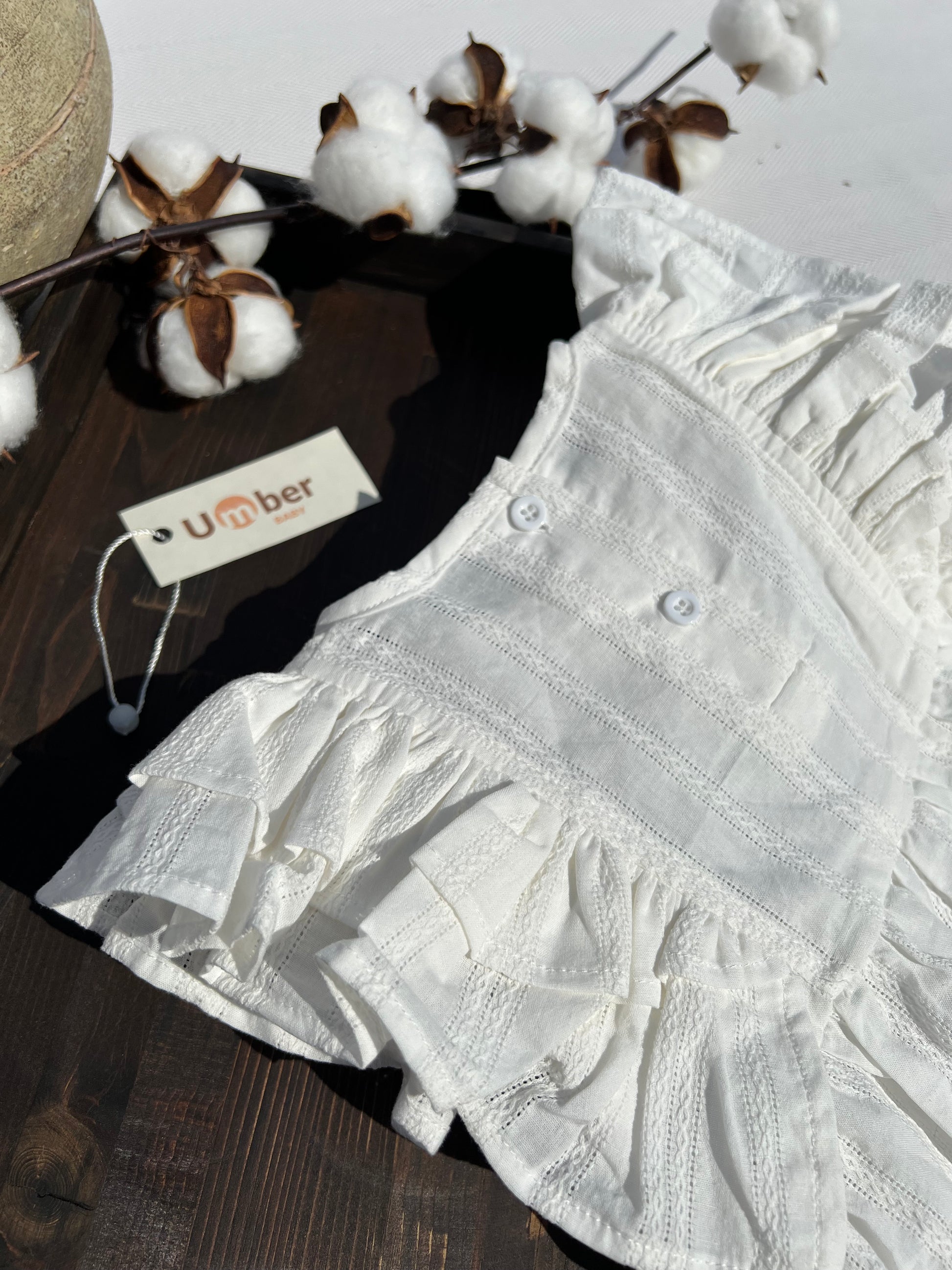 White Ruffle Sleeve Baby Romper with Two White Buttons at the Back