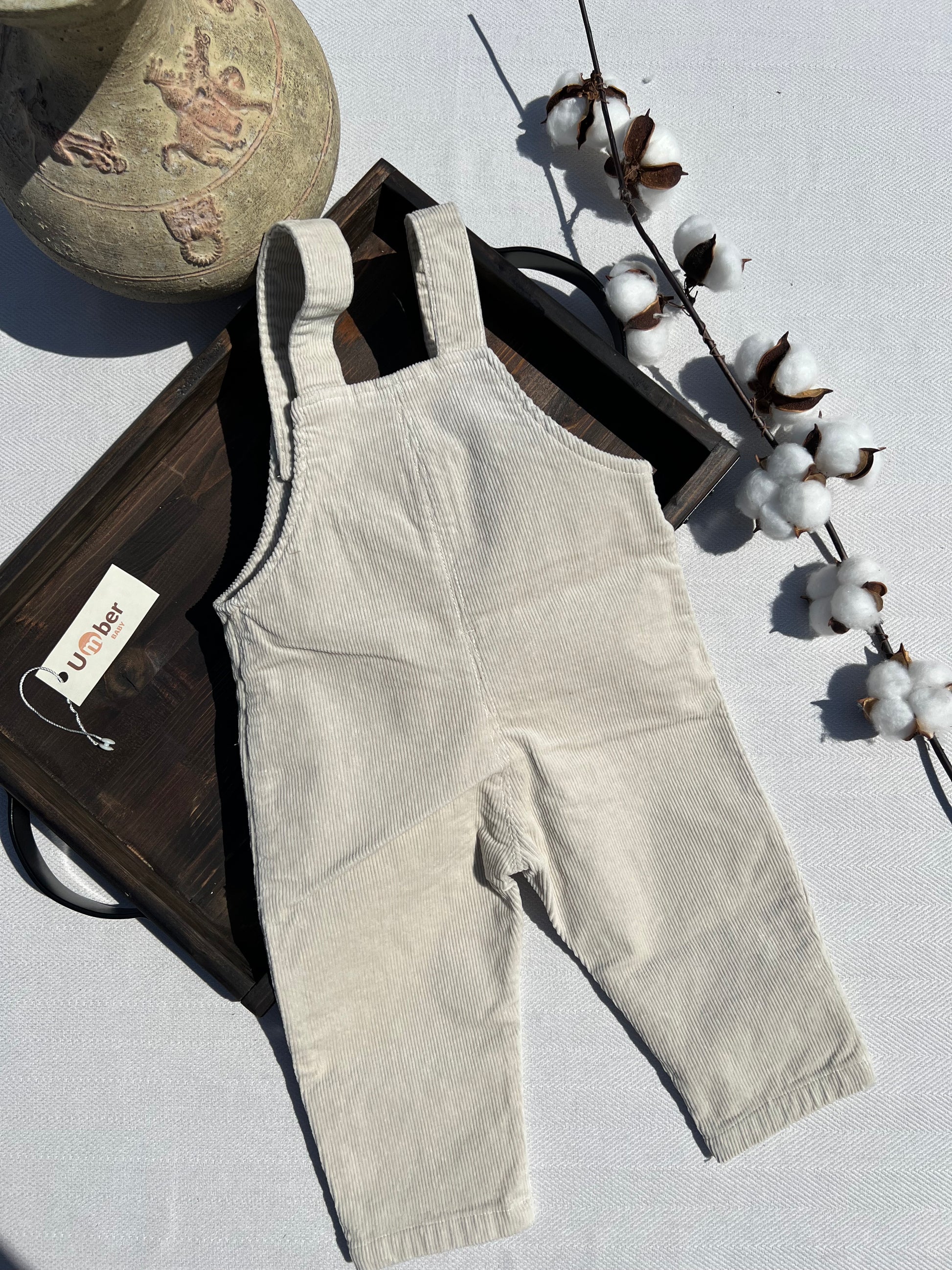 Back of Sand Colored Corduroy Baby Overalls
