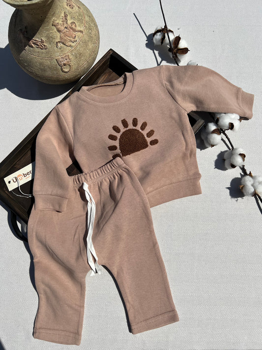 Brown Baby Sweatsuit Set with Long Sleeve Sweatshirt with a Dark Brown Sherpa Sun Design and Matching Brown Sweatpants with non-adjustable White Tie Strings