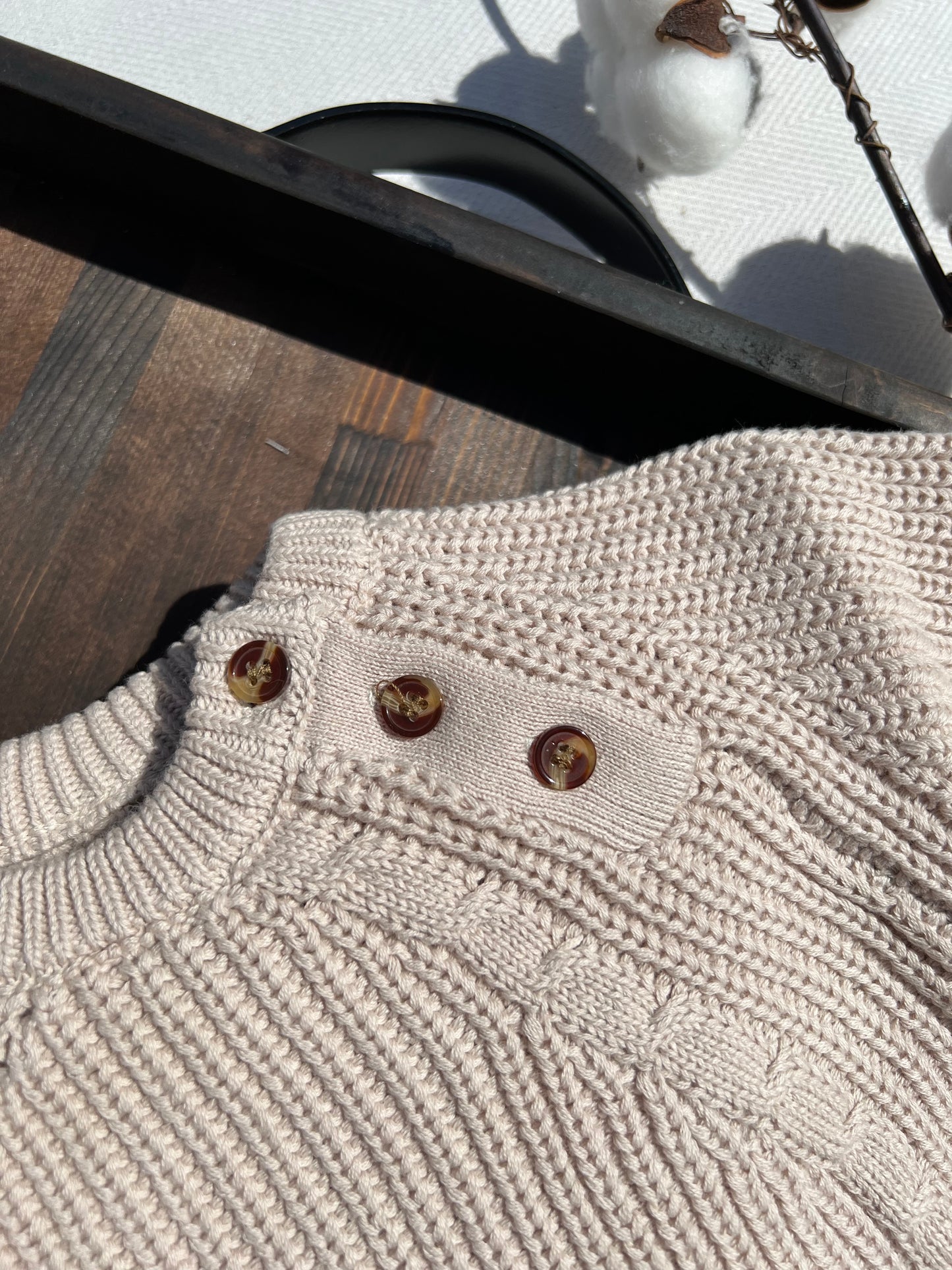 Sand Colored Knitted Long Sleeve Baby Sweater Romper with Three Buttons near the Neck