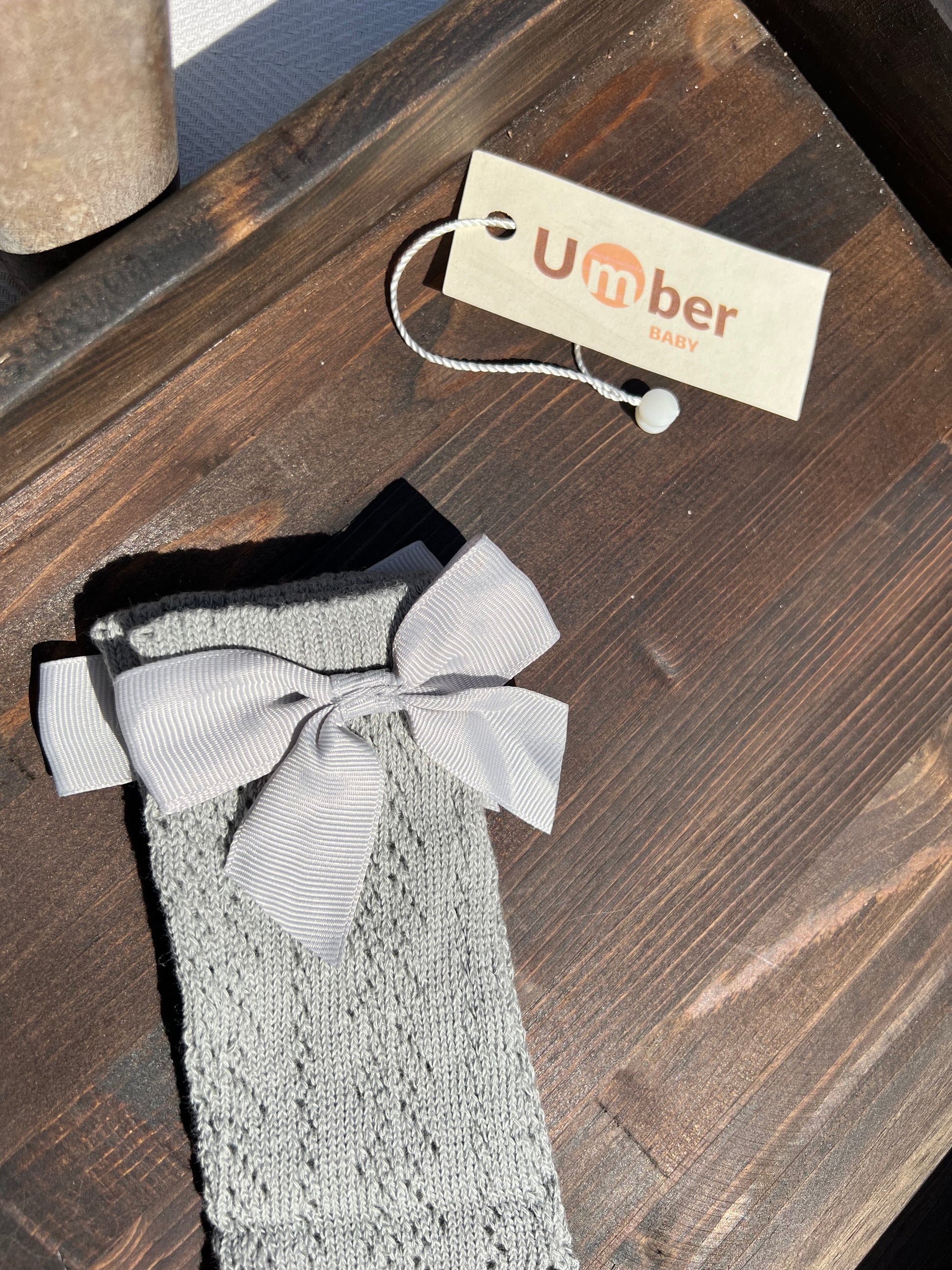 Gray Knee High Baby Socks with a Bow at the Top